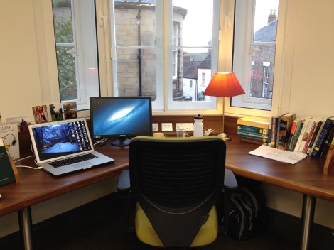 This is where I spend most of my days.  Some people ask me if I am tempted to day dream by looking out the window.  I call it *ahem* seeking inspiration.